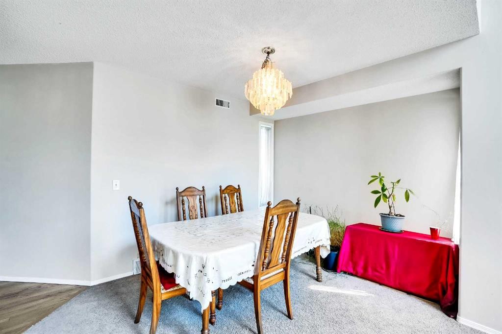 69 Coral Springs Park Ne, Calgary, AB - Indoor Photo Showing Dining Room