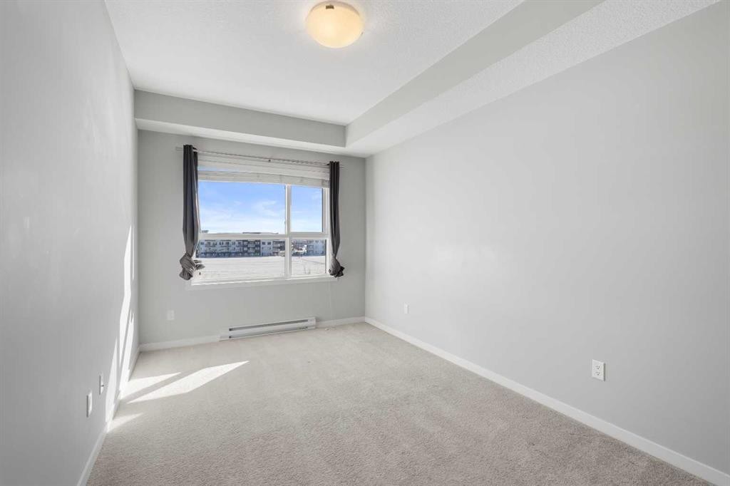 305-20 Seton Park Se, Calgary, AB - Indoor Photo Showing Other Room