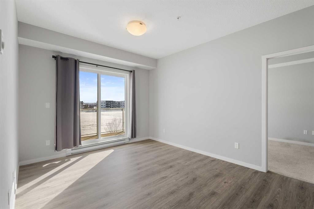 305-20 Seton Park Se, Calgary, AB - Indoor Photo Showing Other Room