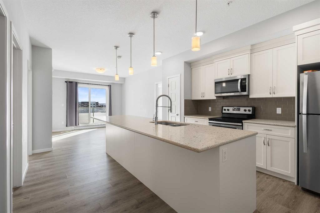 305-20 Seton Park Se, Calgary, AB - Indoor Photo Showing Kitchen With Upgraded Kitchen