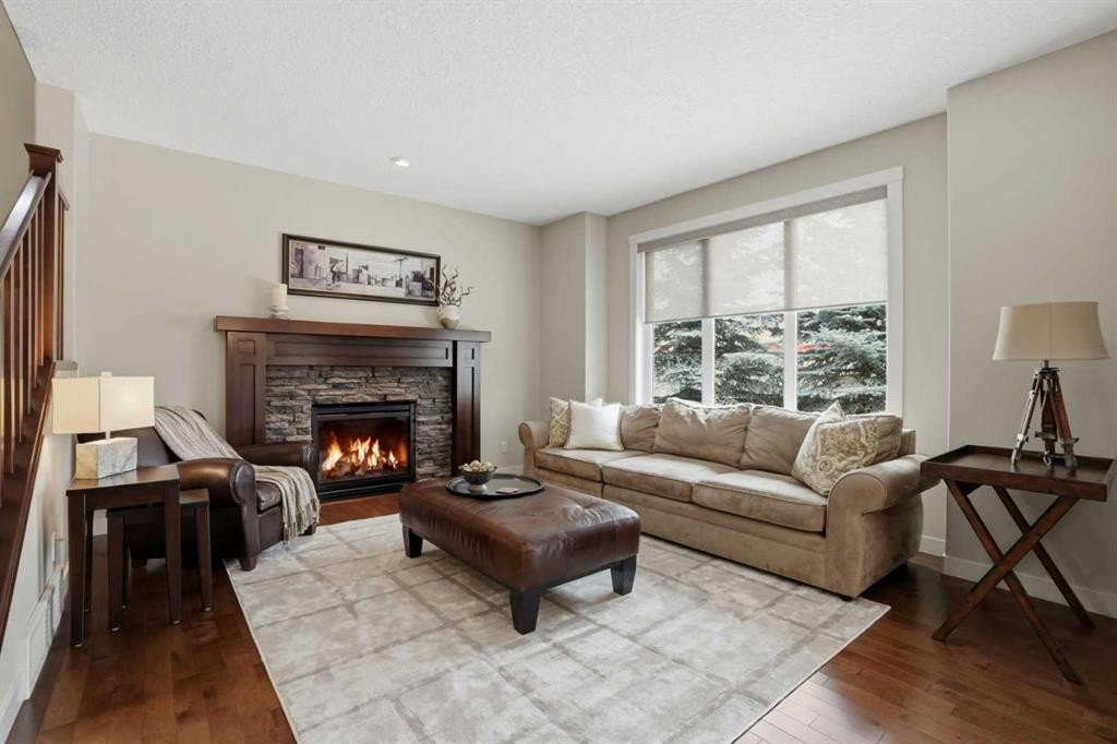 95 Cranarch Circle Se, Calgary, AB - Indoor Photo Showing Living Room With Fireplace