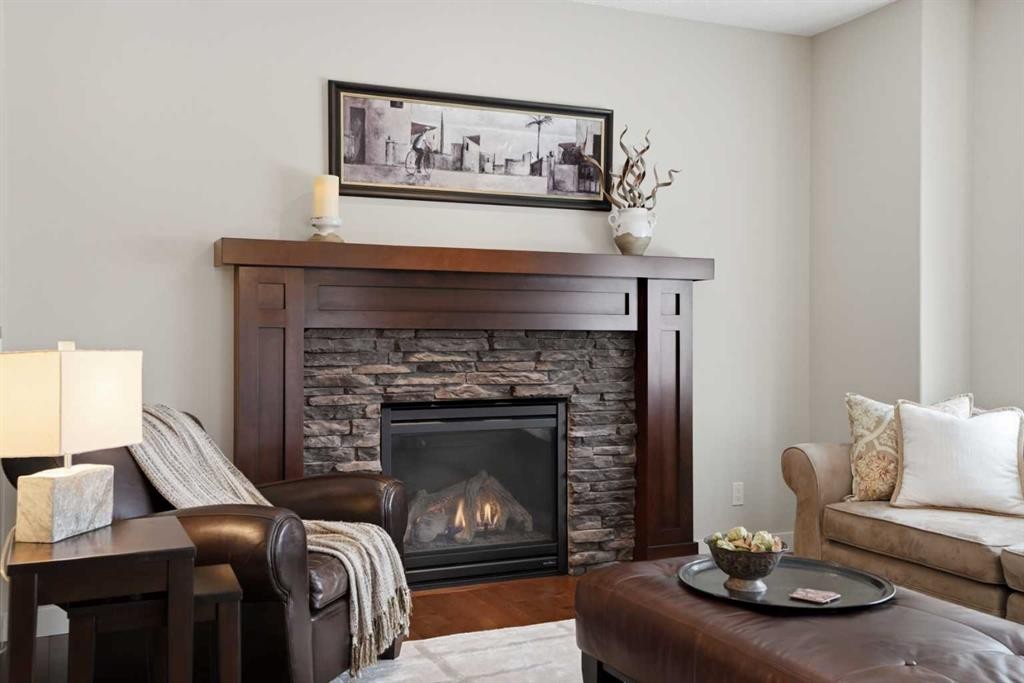 95 Cranarch Circle Se, Calgary, AB - Indoor Photo Showing Living Room With Fireplace