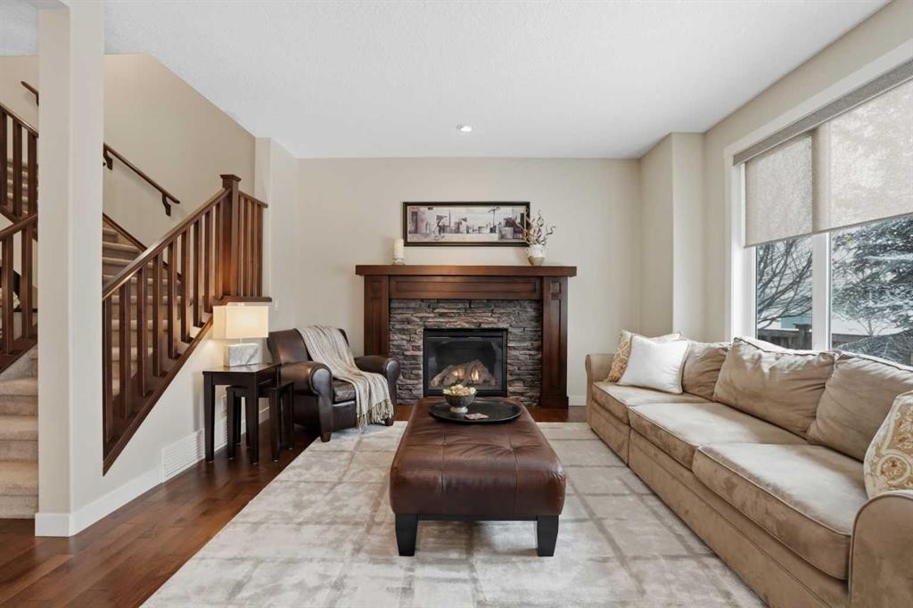 95 Cranarch Circle Se, Calgary, AB - Indoor Photo Showing Living Room With Fireplace