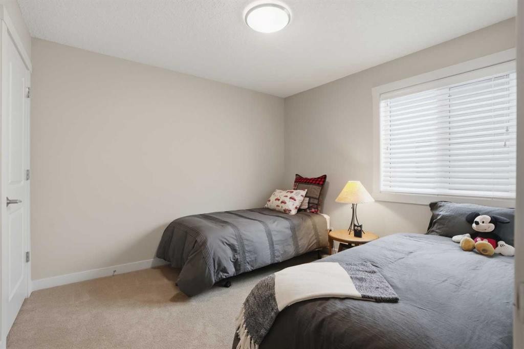 95 Cranarch Circle Se, Calgary, AB - Indoor Photo Showing Bedroom