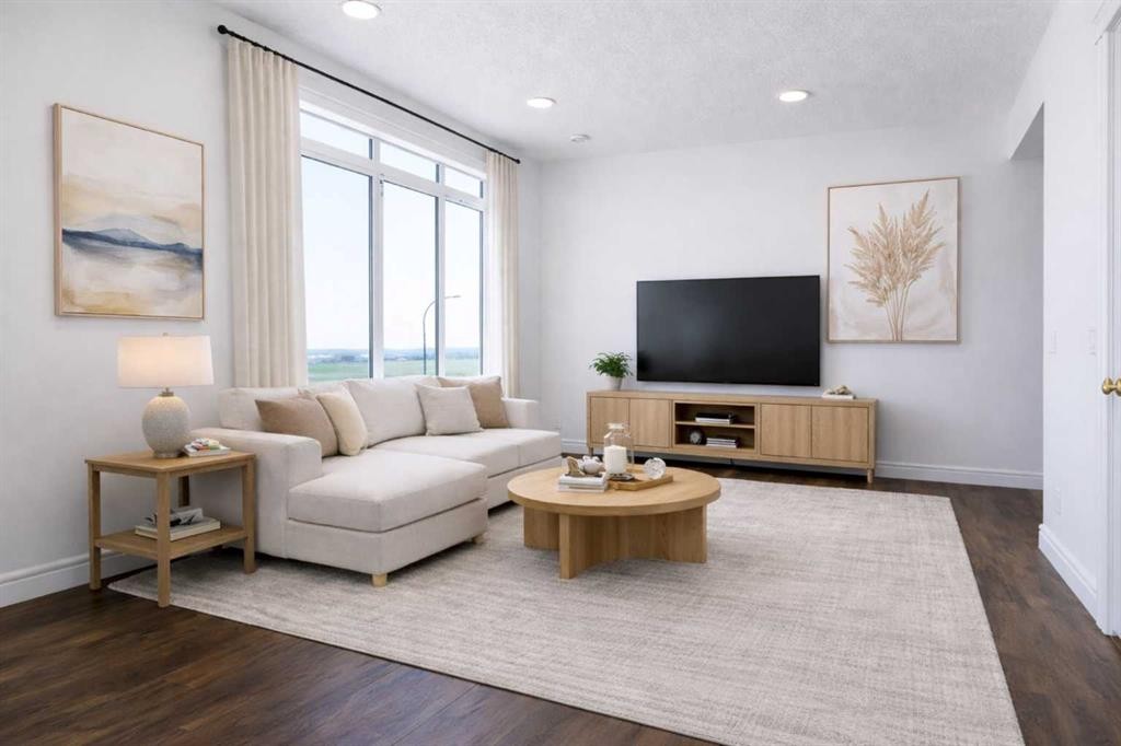 209-414 Seton Passage Se, Calgary, AB - Indoor Photo Showing Living Room