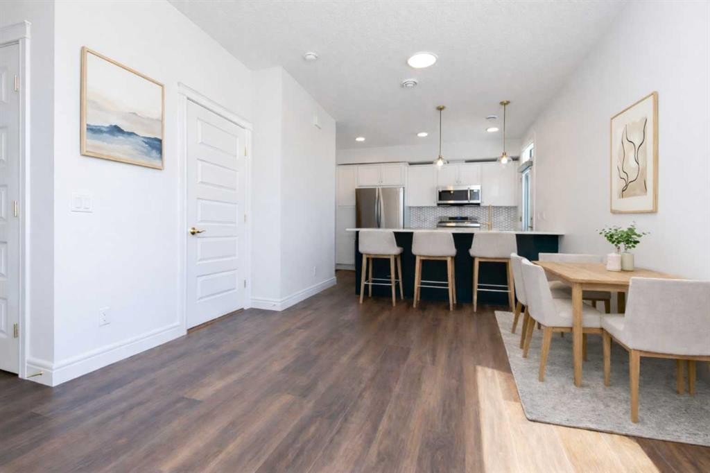 209-414 Seton Passage Se, Calgary, AB - Indoor Photo Showing Dining Room