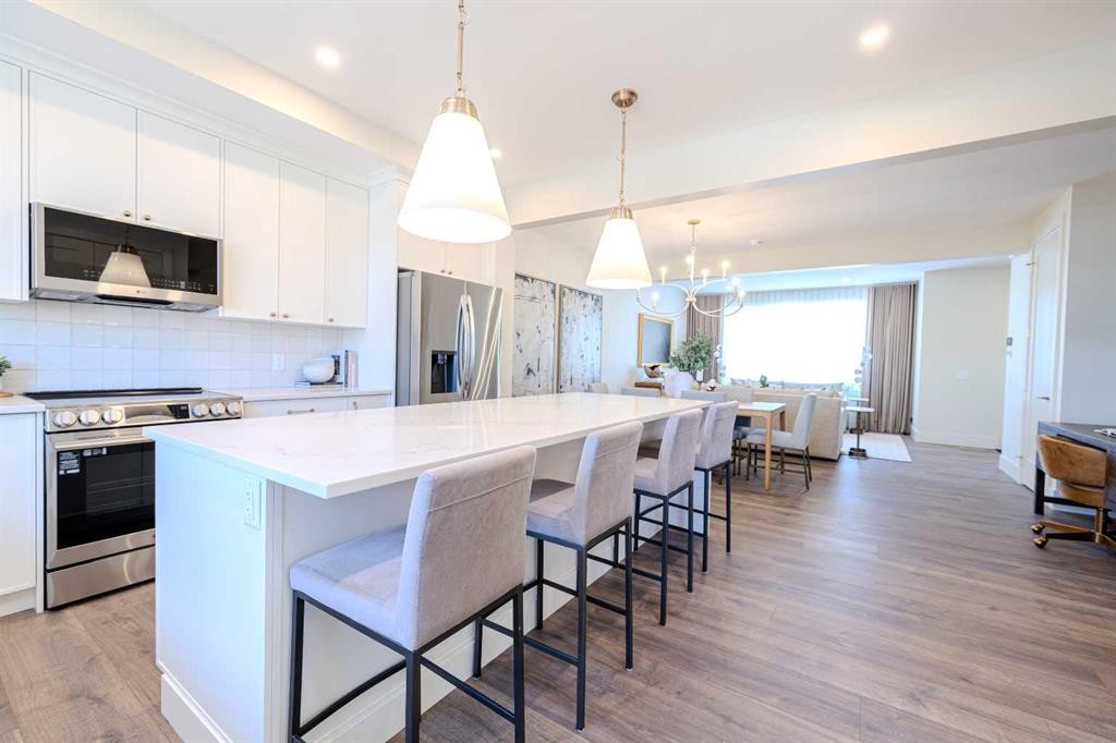 14 Tillotson Downs, Okotoks, AB - Indoor Photo Showing Kitchen With Upgraded Kitchen