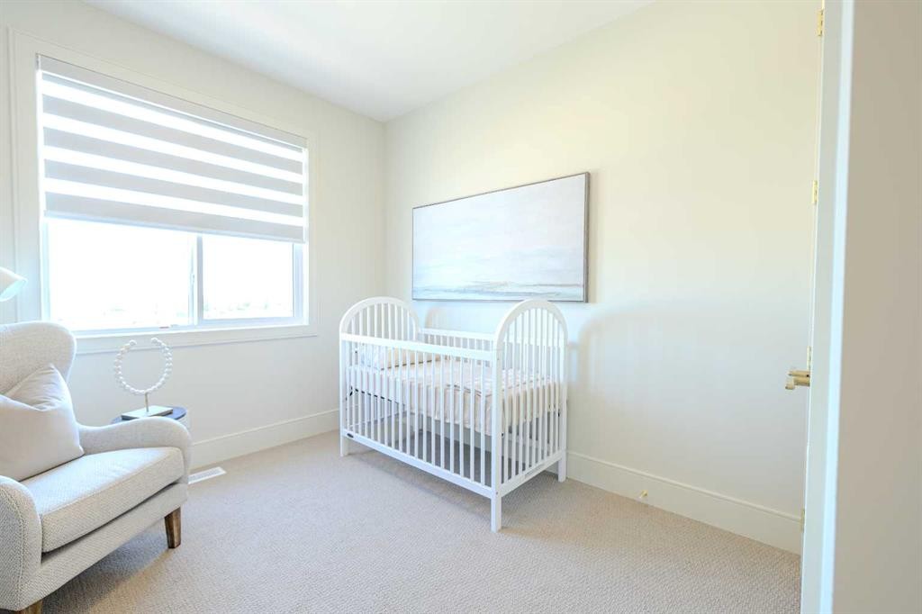 14 Tillotson Downs, Okotoks, AB - Indoor Photo Showing Bedroom