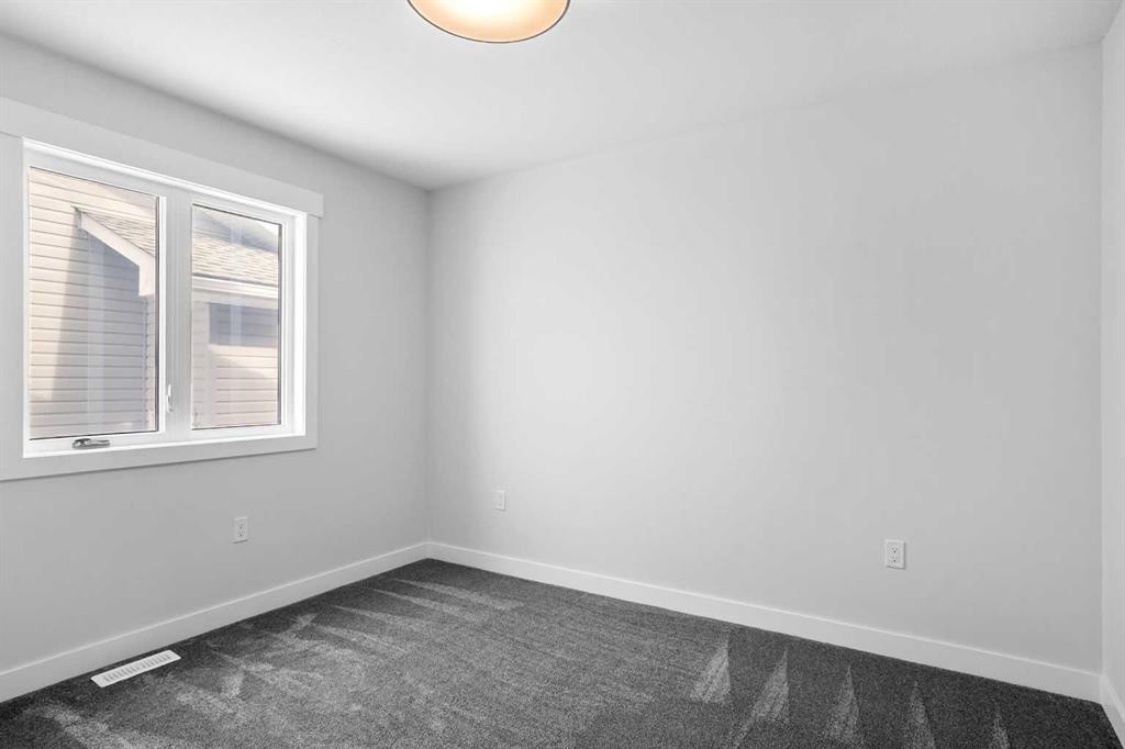 3442 Victory Way, Olds, AB - Indoor Photo Showing Other Room