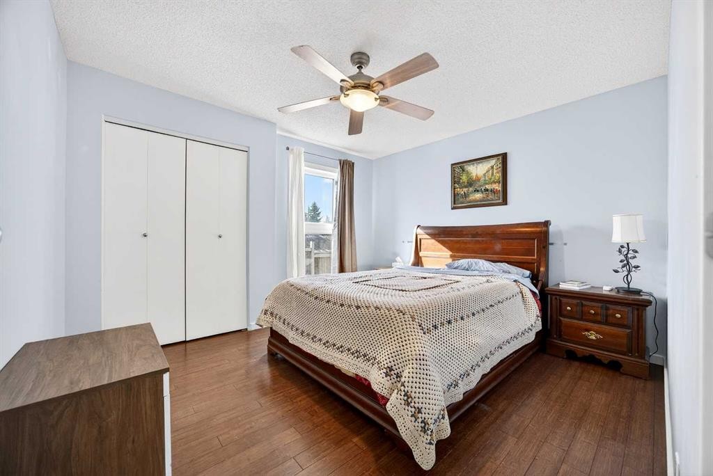 52 Dover Ridge Place Se, Calgary, AB - Indoor Photo Showing Bedroom