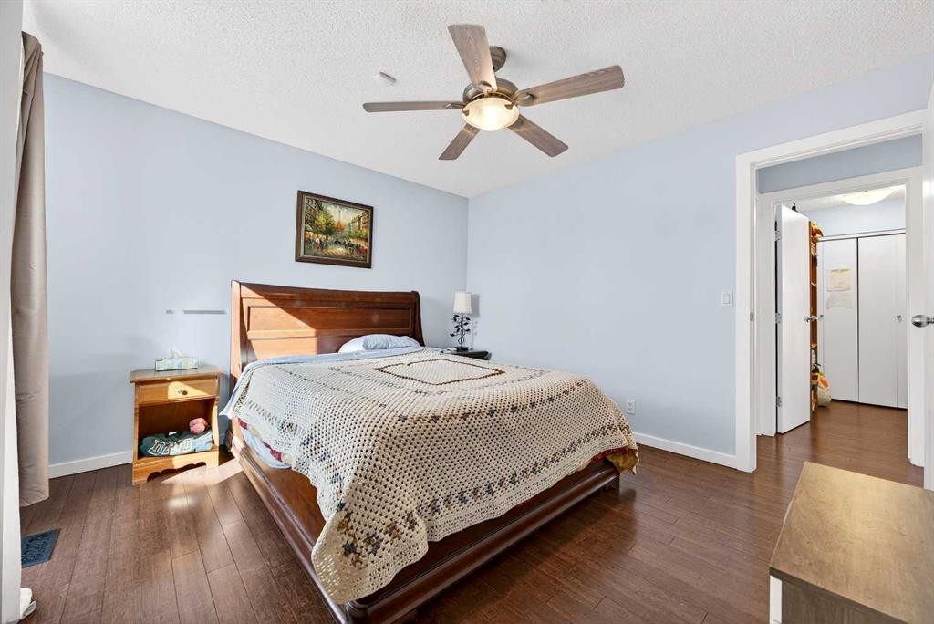 52 Dover Ridge Place Se, Calgary, AB - Indoor Photo Showing Bedroom
