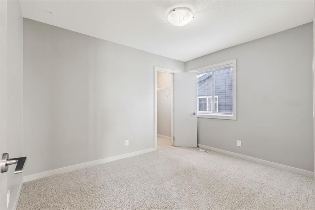 63 Copperstone Drive Se, Calgary, AB - Indoor Photo Showing Other Room