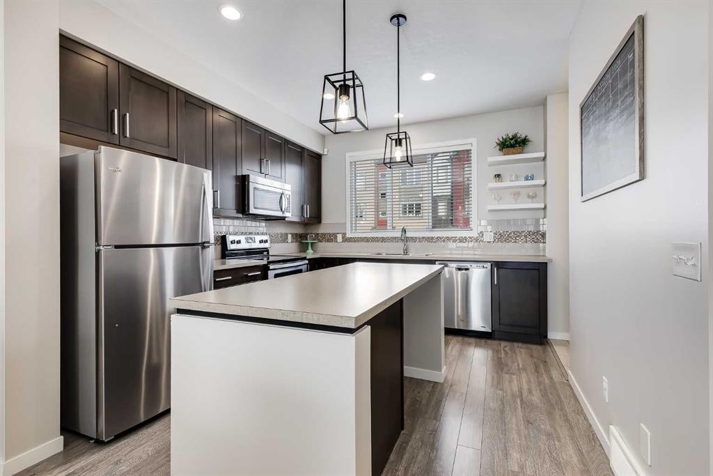 20 Copperpond Rise Se, Calgary, AB - Indoor Photo Showing Kitchen With Stainless Steel Kitchen With Upgraded Kitchen