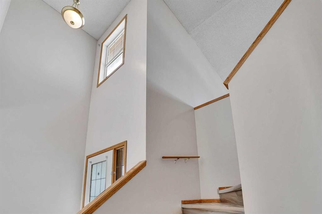 17 Taracove Crescent Ne, Calgary, AB - Indoor Photo Showing Other Room