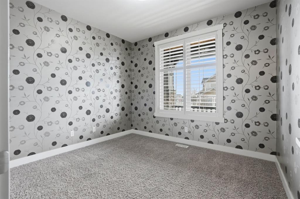 595 Panamount Boulevard Nw, Calgary, AB - Indoor Photo Showing Other Room