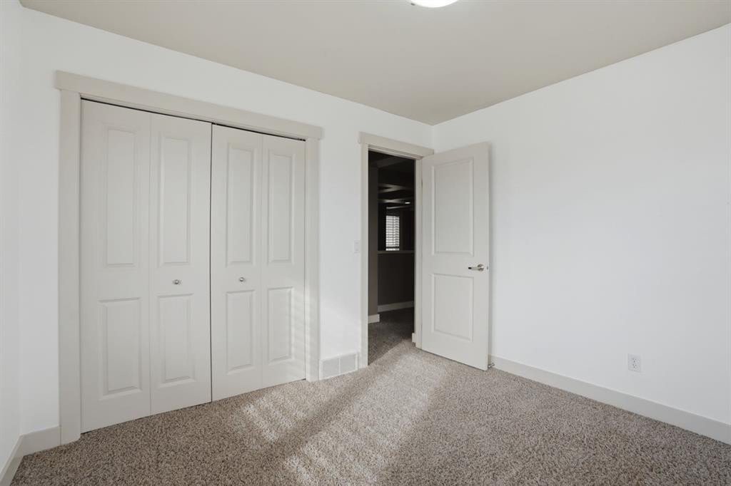 595 Panamount Boulevard Nw, Calgary, AB - Indoor Photo Showing Other Room