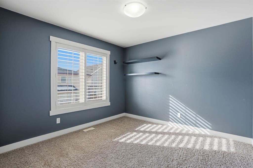 595 Panamount Boulevard Nw, Calgary, AB - Indoor Photo Showing Other Room