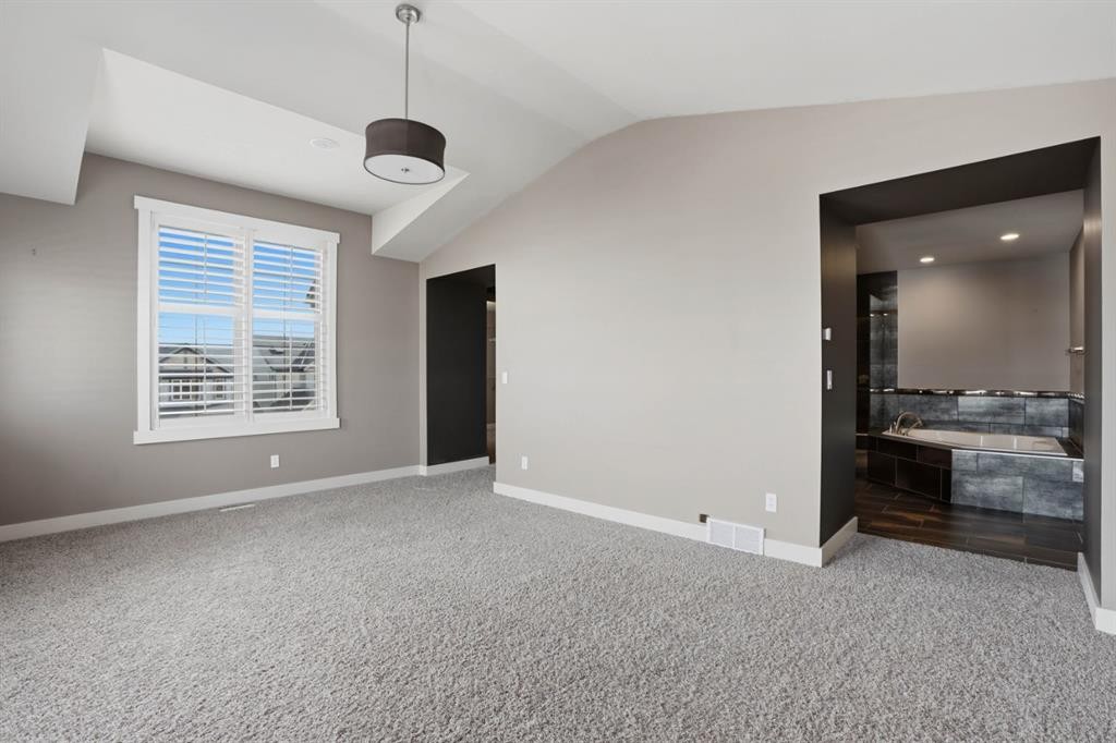 595 Panamount Boulevard Nw, Calgary, AB - Indoor Photo Showing Other Room