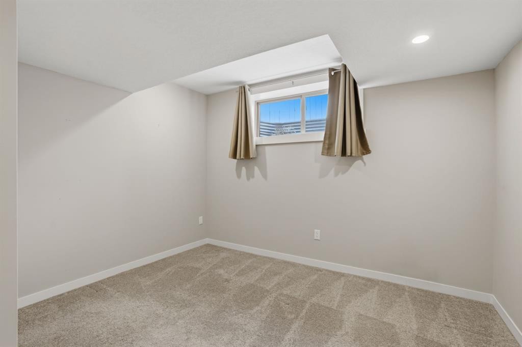 595 Panamount Boulevard Nw, Calgary, AB - Indoor Photo Showing Other Room