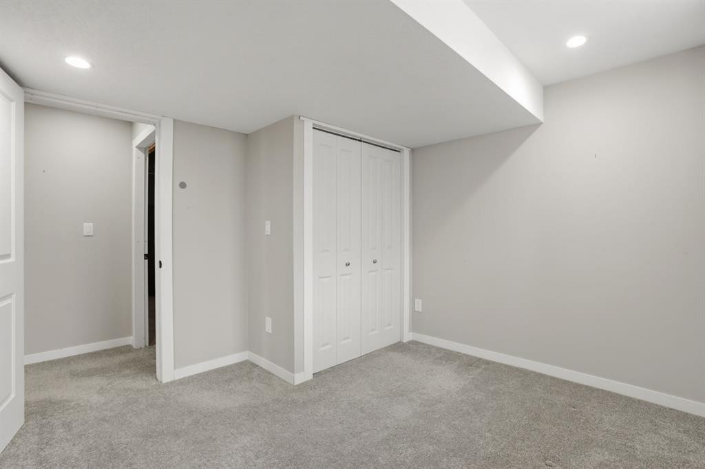 595 Panamount Boulevard Nw, Calgary, AB - Indoor Photo Showing Other Room