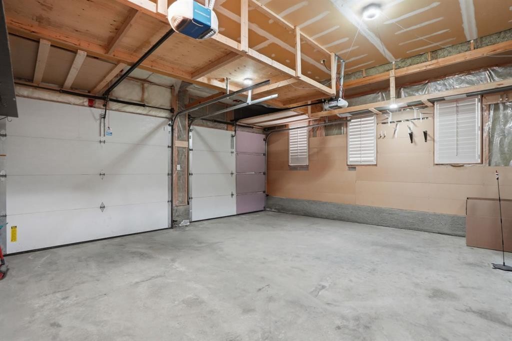 595 Panamount Boulevard Nw, Calgary, AB - Indoor Photo Showing Garage