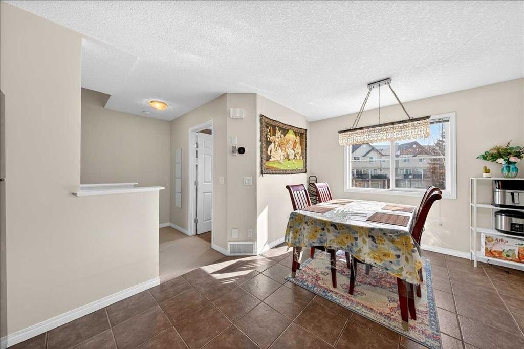 99 Copperfield Court Se, Calgary, AB - Indoor Photo Showing Dining Room
