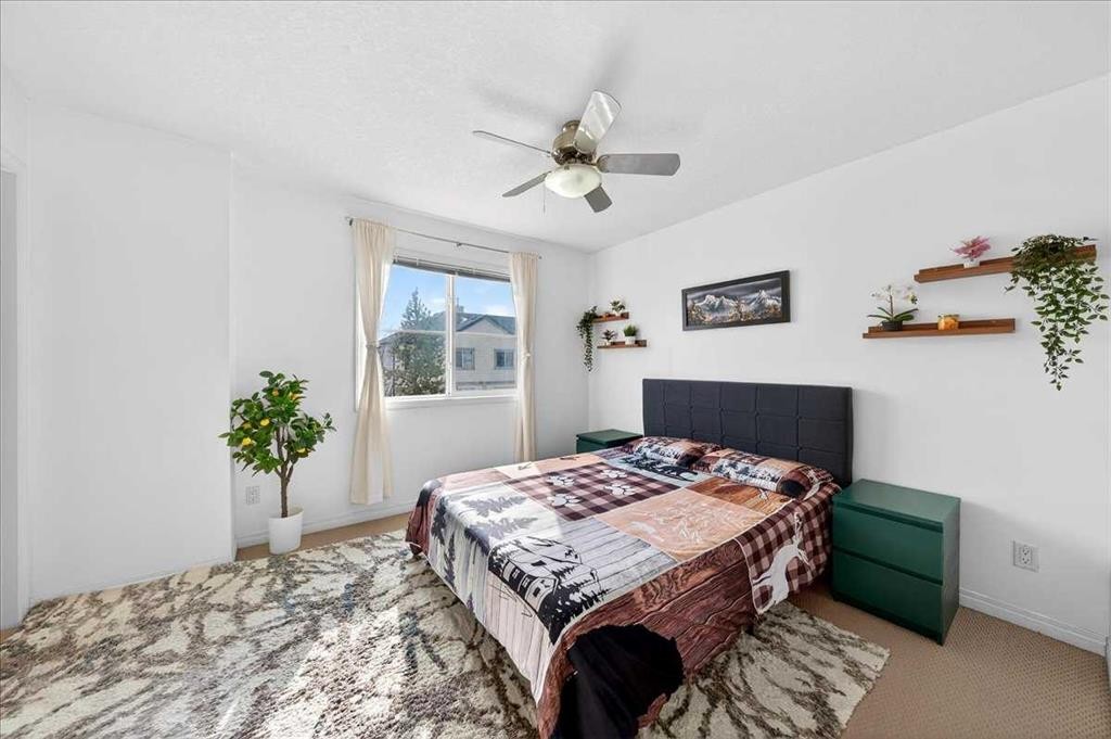 99 Copperfield Court Se, Calgary, AB - Indoor Photo Showing Bedroom