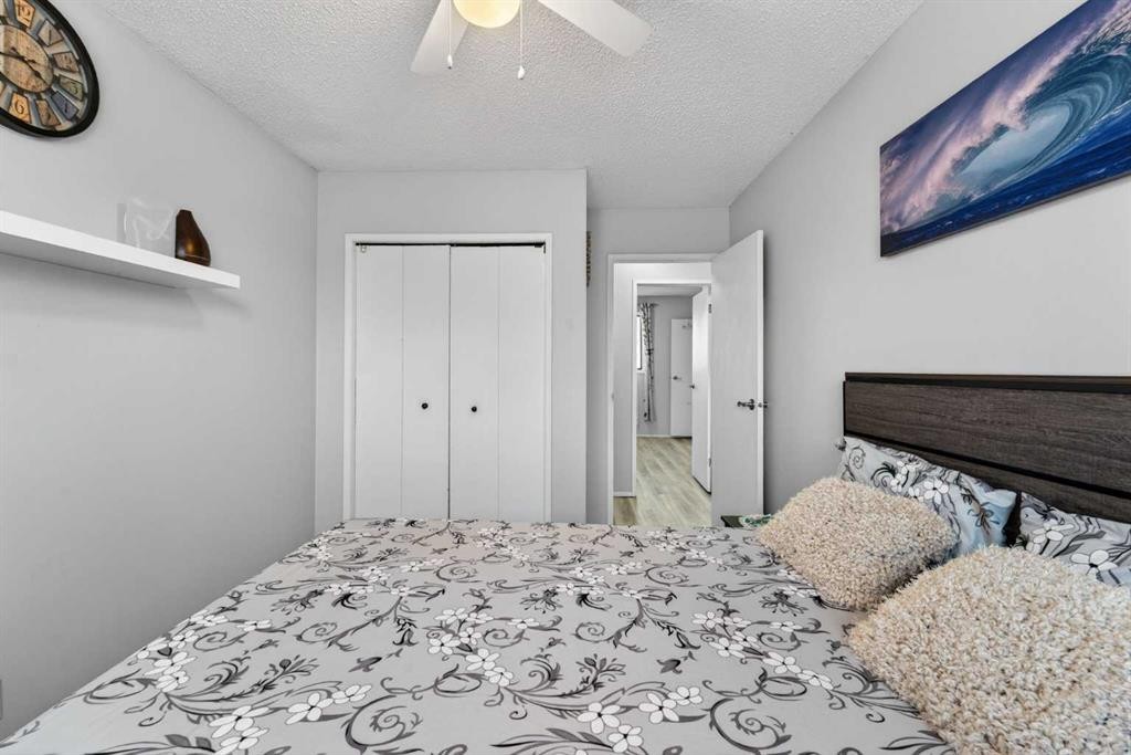 195 Fallswater Road Ne, Calgary, AB - Indoor Photo Showing Bedroom