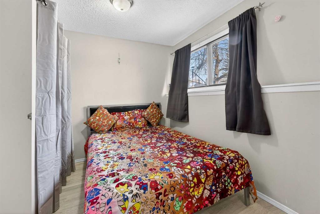 195 Fallswater Road Ne, Calgary, AB - Indoor Photo Showing Bedroom