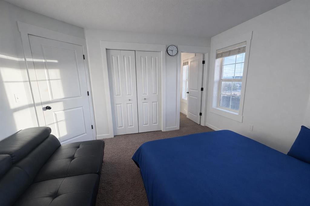 292 Rainbow Falls Drive, Chestermere, AB - Indoor Photo Showing Bedroom