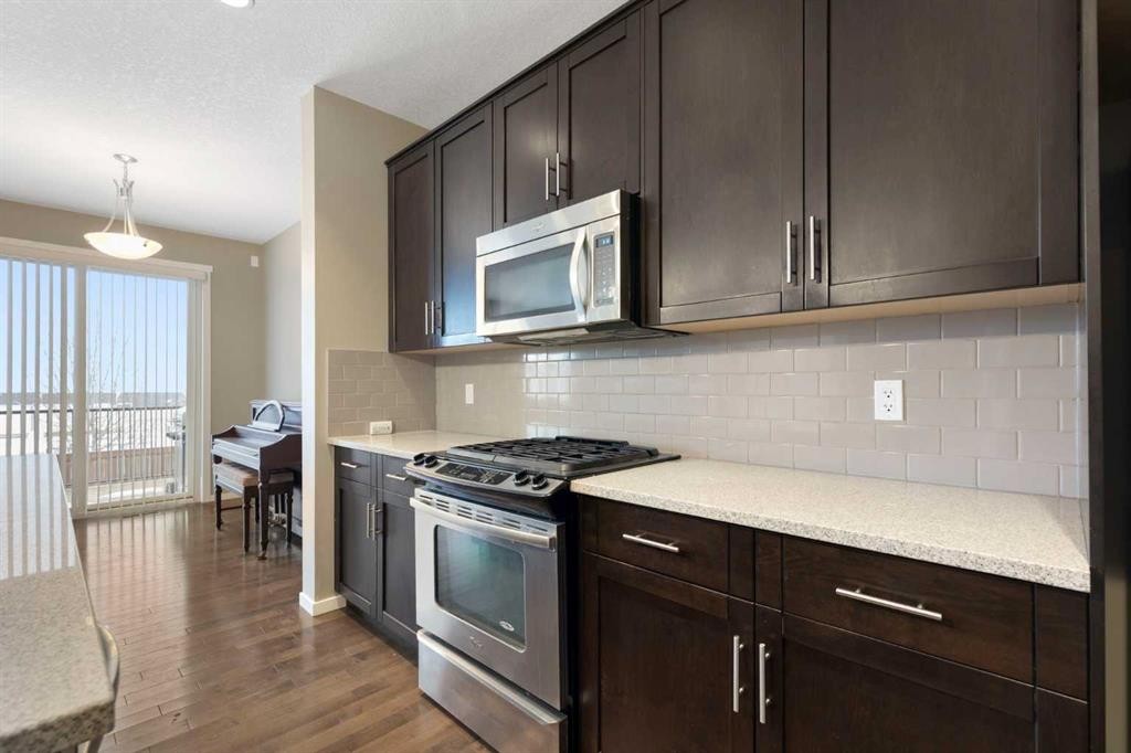 98 Nolanfield Road Nw, Calgary, AB - Indoor Photo Showing Kitchen With Upgraded Kitchen