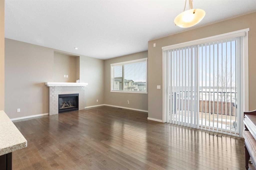 98 Nolanfield Road Nw, Calgary, AB - Indoor Photo Showing Living Room With Fireplace