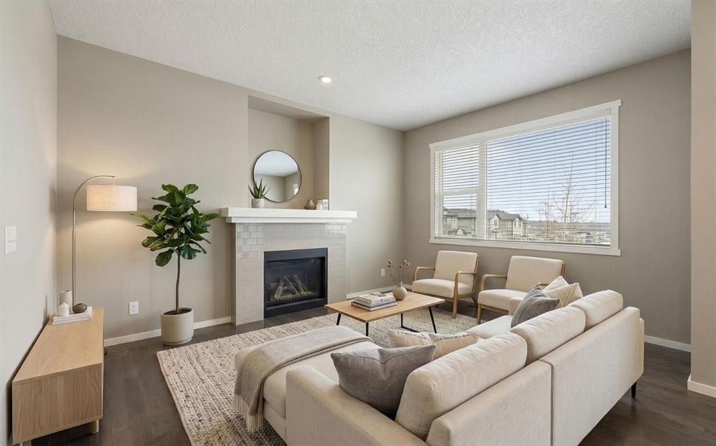 98 Nolanfield Road Nw, Calgary, AB - Indoor Photo Showing Living Room With Fireplace