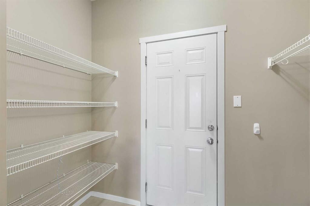 98 Nolanfield Road Nw, Calgary, AB - Indoor With Storage