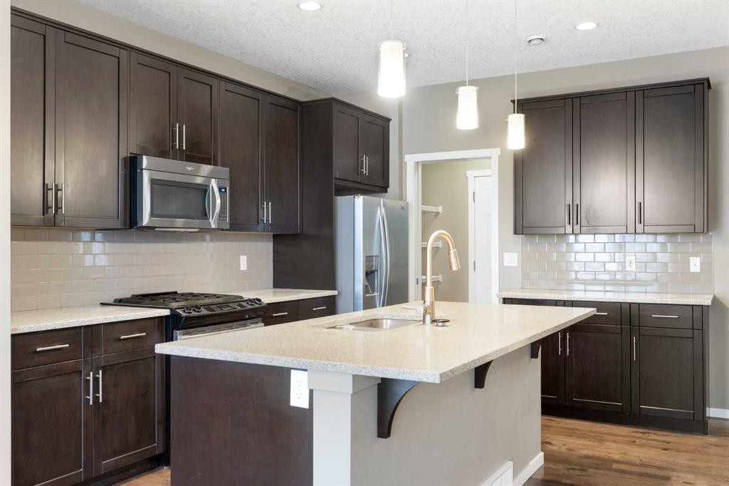 98 Nolanfield Road Nw, Calgary, AB - Indoor Photo Showing Kitchen With Upgraded Kitchen