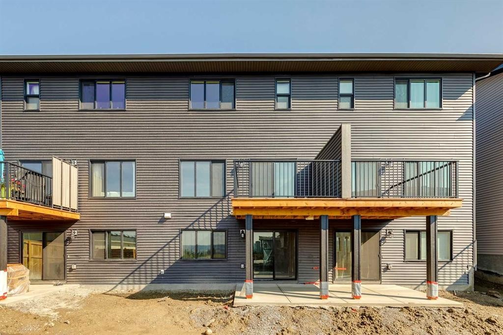 44 Heritage Manor, Cochrane, AB - Outdoor With Deck Patio Veranda With Exterior