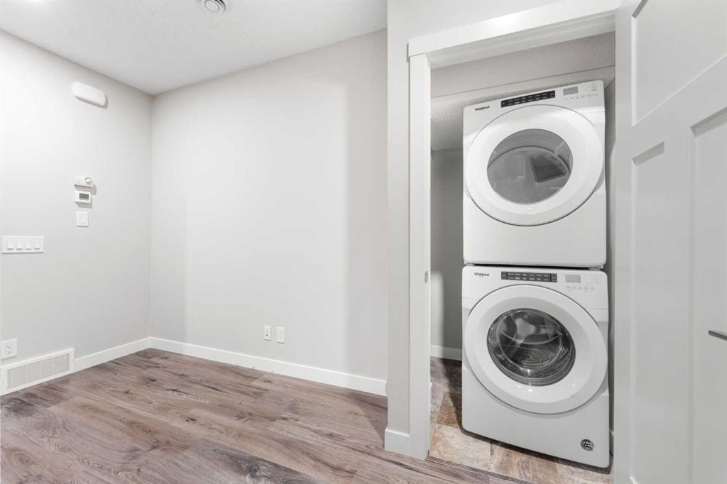 24 Seton Grove Se, Calgary, AB - Indoor Photo Showing Laundry Room