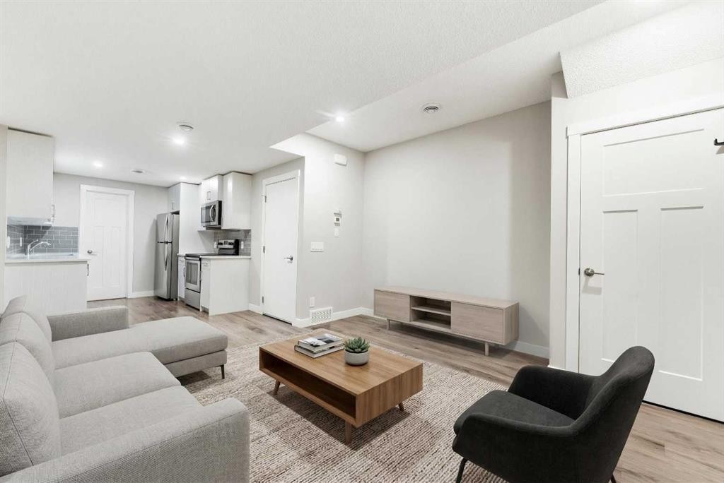 24 Seton Grove Se, Calgary, AB - Indoor Photo Showing Living Room
