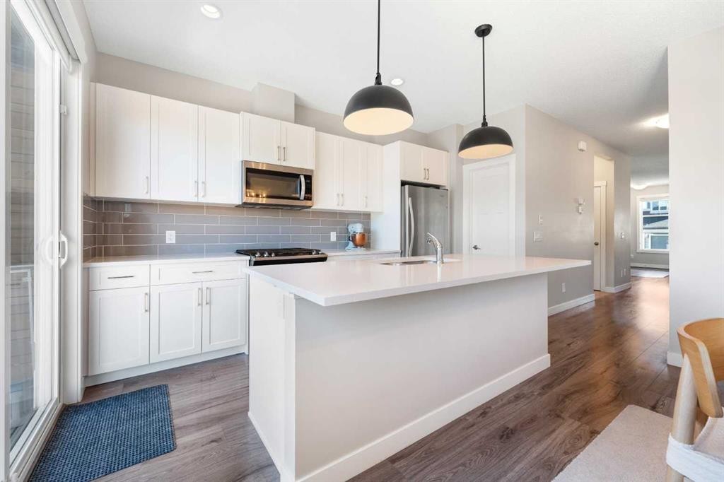 24 Seton Grove Se, Calgary, AB - Indoor Photo Showing Kitchen With Stainless Steel Kitchen With Upgraded Kitchen