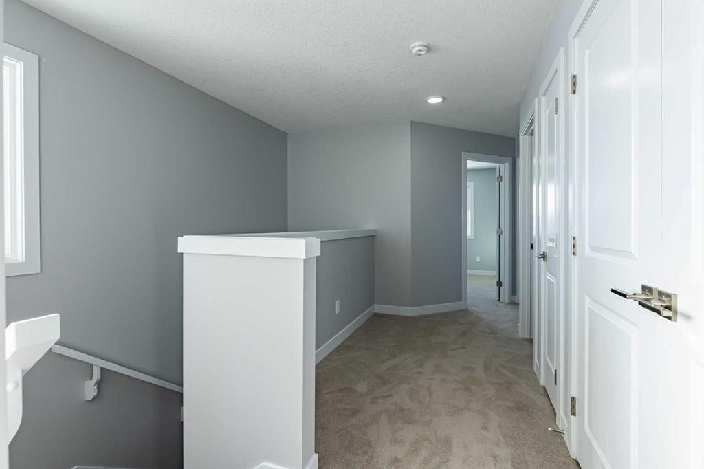 3 Heritage Point, Cochrane, AB - Indoor Photo Showing Other Room