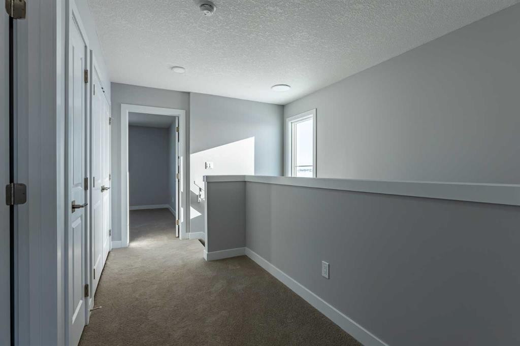3 Heritage Point, Cochrane, AB - Indoor Photo Showing Other Room
