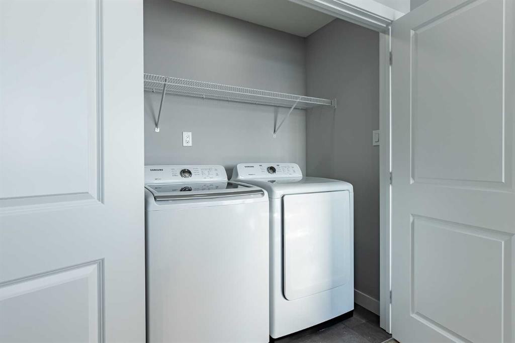 3 Heritage Point, Cochrane, AB - Indoor Photo Showing Laundry Room
