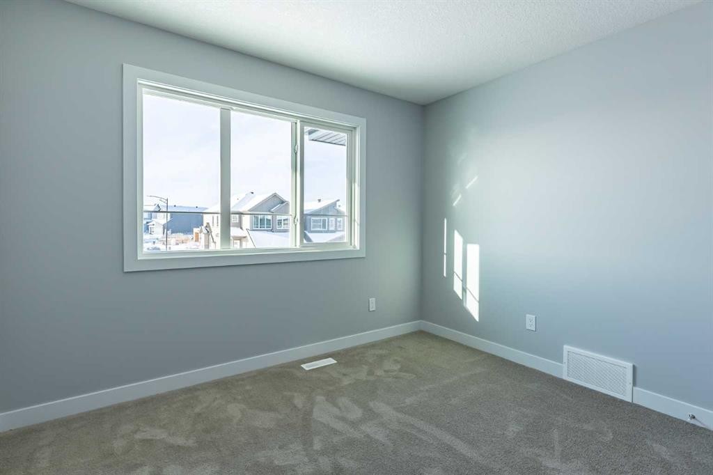 3 Heritage Point, Cochrane, AB - Indoor Photo Showing Other Room