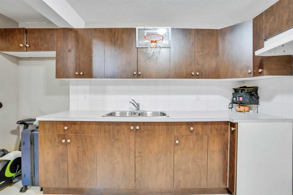 43 Falshire Close Ne, Calgary, AB - Indoor Photo Showing Kitchen With Double Sink