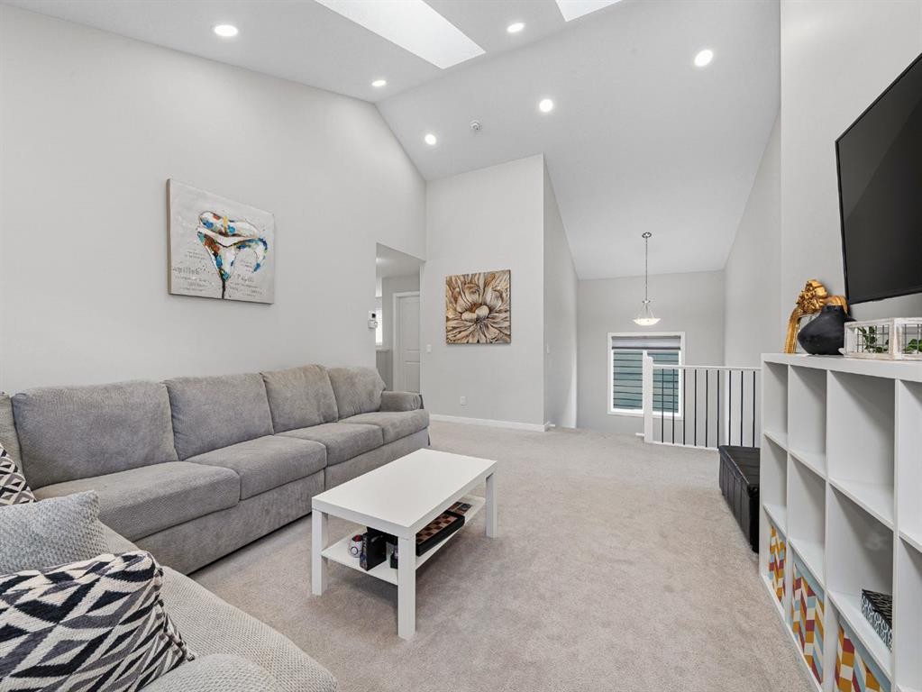 44 Masters Terrace Se, Calgary, AB - Indoor Photo Showing Living Room