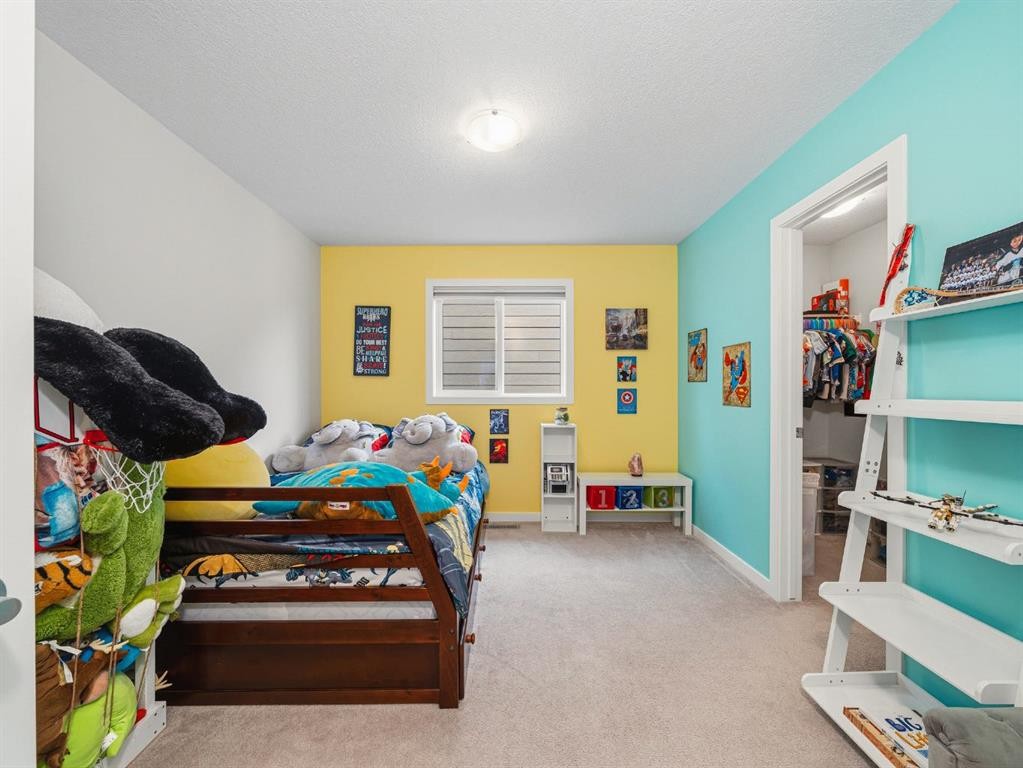 44 Masters Terrace Se, Calgary, AB - Indoor Photo Showing Bedroom