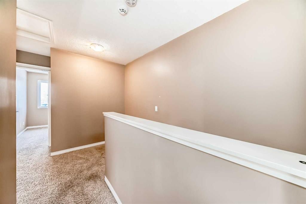 207-620 Luxstone Landing Sw, Airdrie, AB - Indoor Photo Showing Other Room