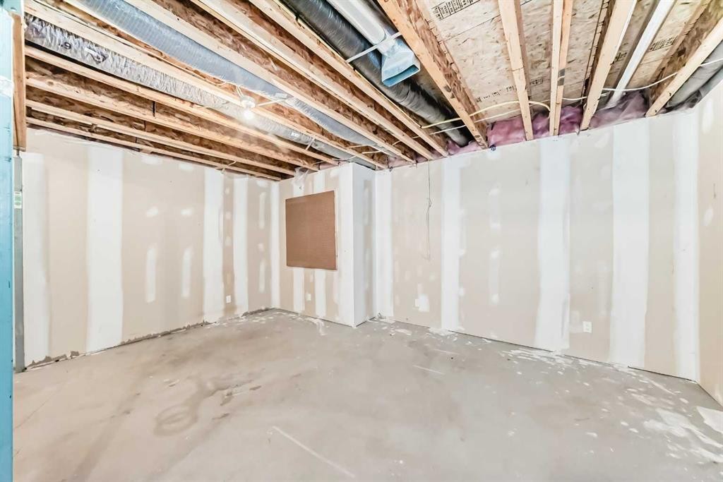207-620 Luxstone Landing Sw, Airdrie, AB - Indoor Photo Showing Basement