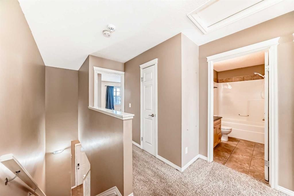 207-620 Luxstone Landing Sw, Airdrie, AB - Indoor Photo Showing Other Room