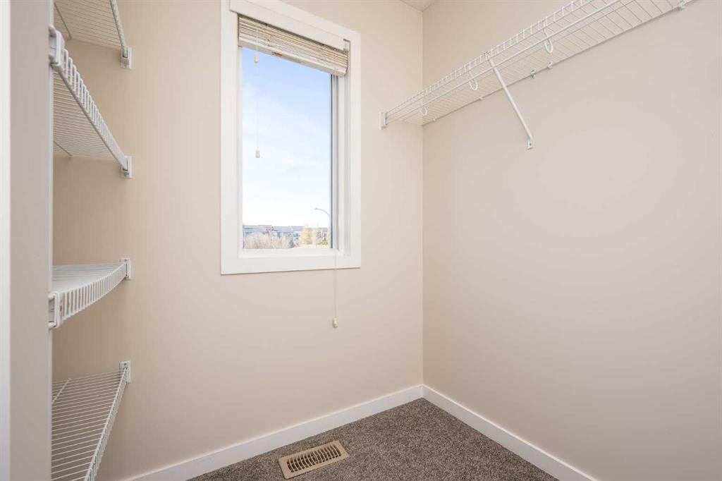 203 Copperstone Park Se, Calgary, AB - Indoor With Storage